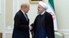 Iranian President Hassan Rohani (right) meets with French Foreign Minister Jean-Yves Le Drian in Tehran on March 5.