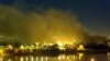 Smoke rises from the Iraqi Planning Ministry on the second day of U.S. raids on the Iraqi capital on March 20, 2003.