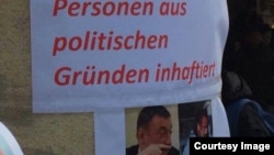 Almaniyada keçirilən aksiyalardan birinin plakatı