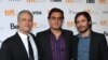 "Rosewater" film director Jon Stewart, Iranian subject Maziar Bahari, and Mexican actor Gael Garcia Bernal (left to right) pose at the Toronto film festival on September 8.