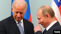 Russian Prime Minister Vladimir Putin (right) meeting with U.S. Vice President in Moscow in Moscow last month