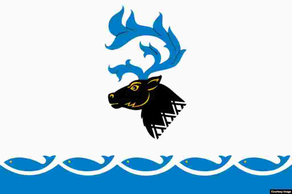 Probably my favorite flag from a purely aesthetic standpoint. It flies over the Yamal district, near the Arctic Ocean. And get this: The antlers of the deer (an important animal for the indigenous population) are flames, a nod to the region’s massive gas fields.