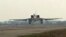A still image, taken from video footage and released by Russia's Defense Ministry on August 18, 2016, shows a Russian Tupolev Tu-22M3 long-range bomber landing at an air base near the Iranian city of Hamadan.