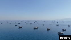 FILE PHOTO: A drone view of vessels anchored in the Strait of Hormuz as seen from Musandam