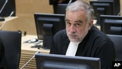 International Criminal Court prosecutor Luis Moreno-Ocampo in a courtroom in The Hague