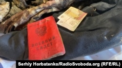 Документи та гроші, виявлені під час огляду загиблого на Донецькому напрямку військовослужбовця армії РФ. 8 червня 2026 року