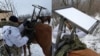 A photo posted on social media by a Ukrainian military adviser purports to show a Russian soldier mounting a Starlink component on a horse. 