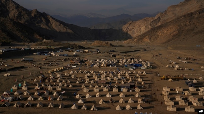 Tents stand in a migrant camp at the Pakistan-Afghanistan border in Torkham, Afghanistan, Friday, November 2023