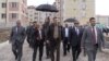 Armenia - Prime Minister Tigran Sarkisian (C) inspects apartment blocks constructed in Gyumri, 26May2012.