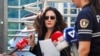 Vlora Hyseni duke dalë nga gjykata në Shqipëri.  
