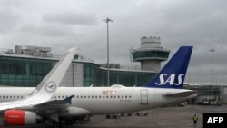 Самолет на SAS на летището в Манчестър (илюстративна снимка).