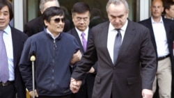 Blind activist Chen Guangcheng being accompanied by U.S. Assistant Secretary of State for East Asian and Pacific Affairs Kurt Campbell (right) and U.S. Ambassador to China Gary Locke (center) in Beijing on May 2.