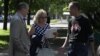 Political activist Vasil Parfyankou (right) outside the courtroom in Minsk on May 29, when he was ordered back to jail.