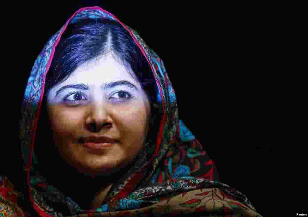 Pakistani teenager Malala Yousafzai, the joint winner of the 2014 Nobel Peace Prize, is shown after speaking at Birmingham library in Birmingham, England. Malala, who was shot in the head by the Taliban in 2012 for advocating girls' right to education, shared the prize with Indian campaigner against child trafficking and labor Kailash Satyarthi. (Reuters/Darren Staples)