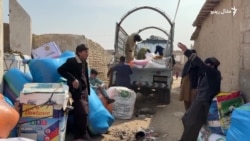 د مردان له جلاله مرکزي کمپه د افغانانو وروستۍ کډې هم بار شوې