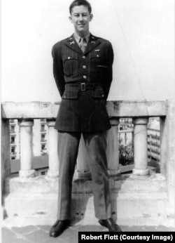 In this undated photo, Flott is seen standing on a rooftop in Algiers, Algeria. Flott served in the US Army in North Africa during World War II.