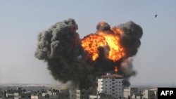 An explosion following an Israeli air strike in the southern Gaza Strip town of Rafah on January 13.