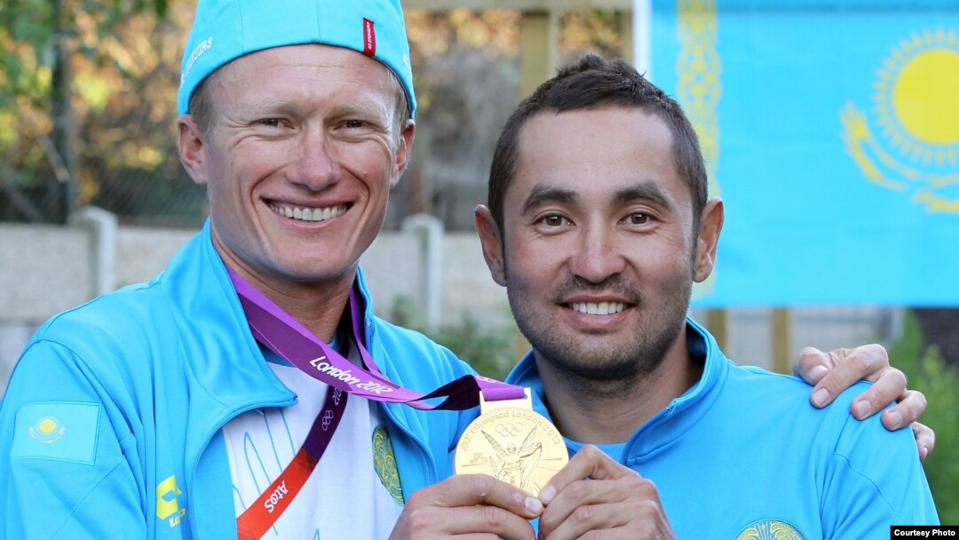 Kazakh cyclist Aleksandr Vinokurov's (left, with teammate Assan Bazaev) triumph on July 28 in the road cycling event set the tone for his country's success, one journalist says.