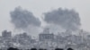 Smoke rises from Gaza after explosions, as seen from Israel