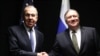 U.S. Secretary of State Mike Pompeo (right) shakes hands with Russian Foreign Minister Sergei Lavrov as they meet on the sidelines of the Arctic Council meeting on May 6.