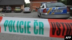 Czech Republic -- The scene of a crime is barred with police tape in Brno, 23May2013