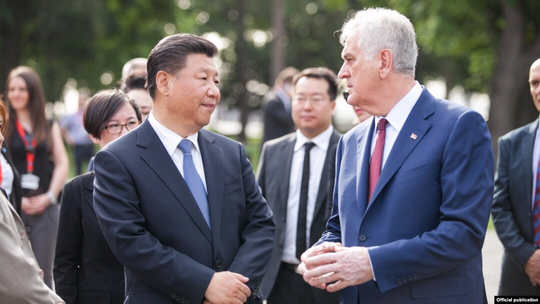 Presidents Xi Jinping of China (left) and Tomislav Nikolic of Serbia talk during the first Chinese visit in the last 30 years to Belgrade on June 17.