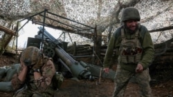 Ukrainian troops fire a self-propelled howitzer toward Russian troops near Pokrovsk earlier this month.