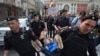 Russian riot police detain gay rights activist Nikolai Alekseyev during an unauthorized gay-rights rally in central Moscow in May.