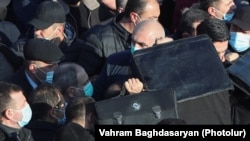 Armenia -- Members of Armenian security services use ballistic folding shields as Prime Minister Nikol Pashinian visits Yerablur Military Pantheon cemetery on the day of nationwide mourning for those killed in a military conflict over Nagorno-Karabakh in December 19, 2020.