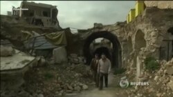 Сирийские военные пустили жителей Алеппо в городскую цитадель (видео)