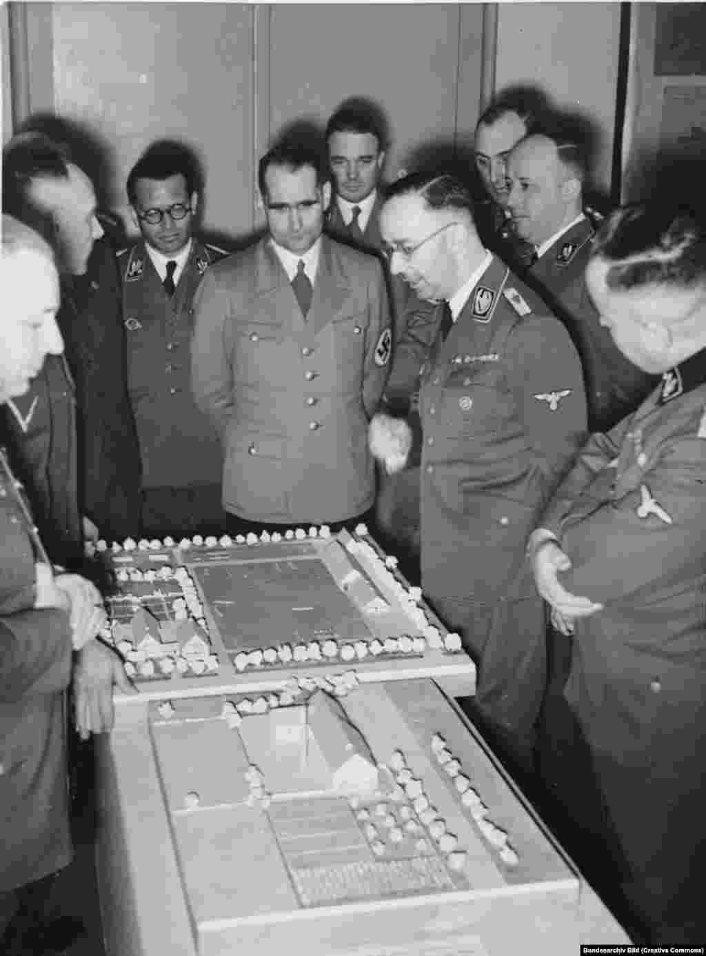 Heinrich Himmler and other senior Nazis look at a plan for ethnic German rural settlements on Soviet territory in March 1941. &nbsp; &nbsp; The invasion had been years in the making, and was hinted at in Nazi leader Adolf Hitler&rsquo;s 1925 manifesto Mein Kampf when he wrote, &quot;If we talk about new soil and territory in Europe today, we can think primarily only of Russia and its vassal border states.&quot;