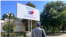 A man standing in front of an election poster for the Russian parliamentary elections in Tiraspol on September 19, 2026