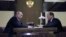 Russian President Vladimir Putin (left) meets with Prime Minister Dmitry Medvedev in Sochi on May 15.