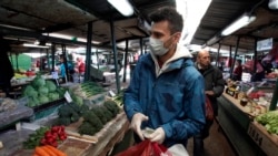 Shopping at a market in North Macedonia's capital Skopje.