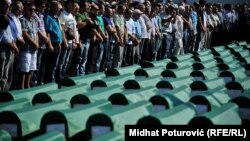 A collective funeral is held for victims found in Tomasica, the largest mass grave uncovered in Europe since World War II. 