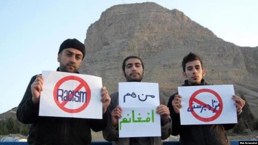Iranians protest against the banning of Afghans in Isfahan from a public park on April 1, also known as Nature Day. One of the signs reads, "I Am Also An Afghan." 