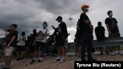 Ҳонконгдаги намойишчилар гуруҳи.