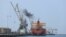 A ship unloads a cargo of fuel at the Red Sea port of Hudaydah, April 1, 2018. File photo