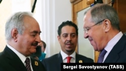 Khalifa Haftar (left), the chief of the Libyan National Army, meets with Russian Foreign Minister Sergei Lavrov in Moscow on August 14.