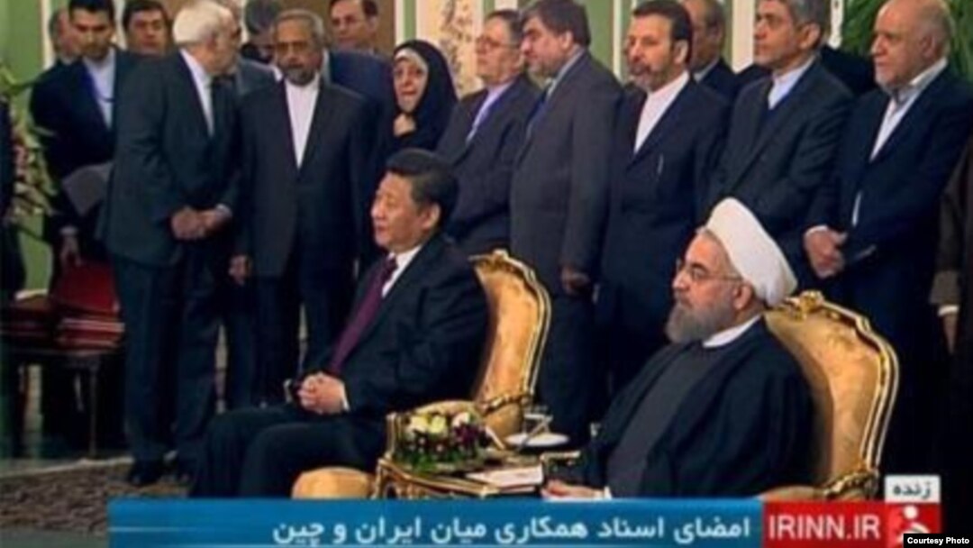 Chinese president Xi Jinping (foreground left) and Iranian President Hassan Rohani (foreground right) in Tehran on January 23.