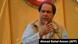 Fugitive former Afghan soccer chief Keramuddin Karim made a defiant public appearance for the first time in about two years in his native Panjshir Province on September 4.