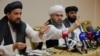 Taliban representatives Abdul Latif Mansoor (left to right), Shahabuddin Delawar, and Suhail Shaheen hold a news conference in Moscow on July 9.