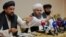 Taliban representatives Abdul Latif Mansoor (left to right), Shahabuddin Delawar, and Suhail Shaheen hold a news conference in Moscow on July 9.