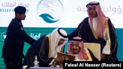 Saudi Arabia's King Salman bin Abdulaziz Al Saud attends Riyadh International Humanitarian Forum in Riyadh, February 26, 2018