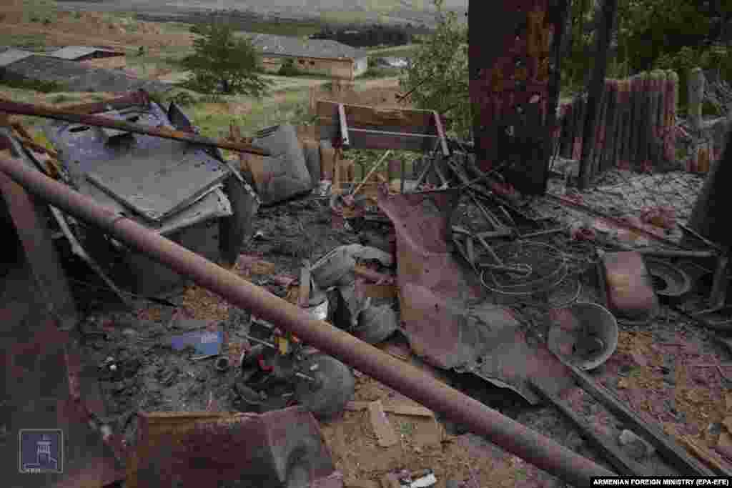 A handout photo made available by the Armenian Foreign Ministry shows damage reportedly caused by fighting between Armenian and Azerbaijani forces in Nagorno-Karabakh.