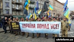 Марш на відзначення Дня волонтера, коли вшановують добровольців, які брали участь у збройному конфлікті на сході України. Київ, 14 березня 2020 року