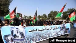 Members of Afghan Hazara community rally to demand the government bring security in Herat in September 2017.