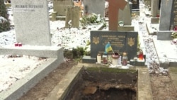 Remains Of Ukrainian Poet In Limbo After Being Exhumed