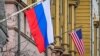 A Russian flag hangs at a building next to the U.S. Embassy in Moscow. (file photo)