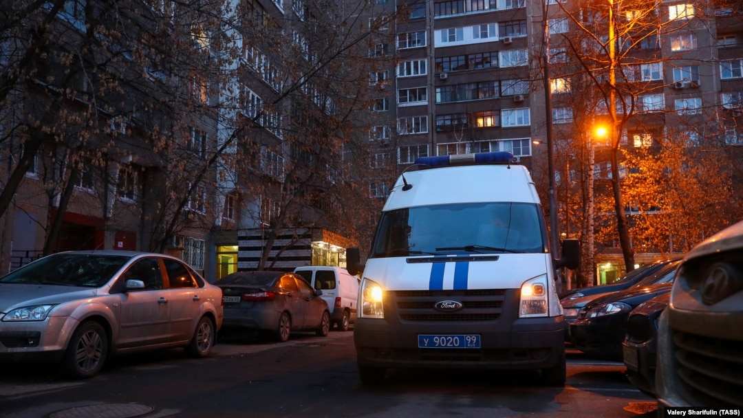 A police vehicle stands outside a residential building in Moscow's Lyublinskaya Street, where Russian opposition activist Aleksei Navalny's apartment is located.